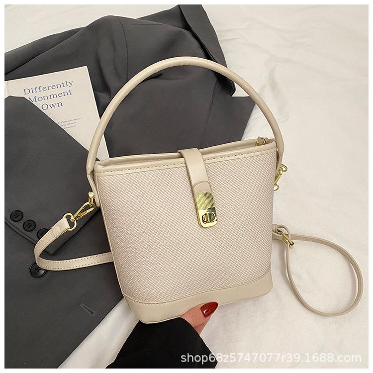 

Korean commuter simple bucket bag messenger bag 2025 summer new high-end foreign versatile portable small bag
