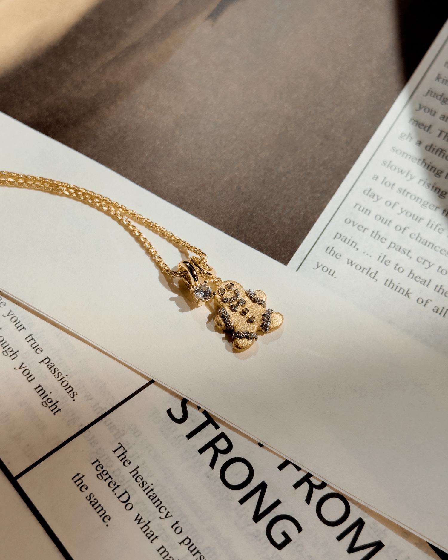 

Little Red Book Gold Gingerbread Man & Christmas Tree Candy Necklace