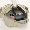 Nylonová crossbody taška s horním uchem a přední kapsou na zip pro muže i ženy pro každodenní použití