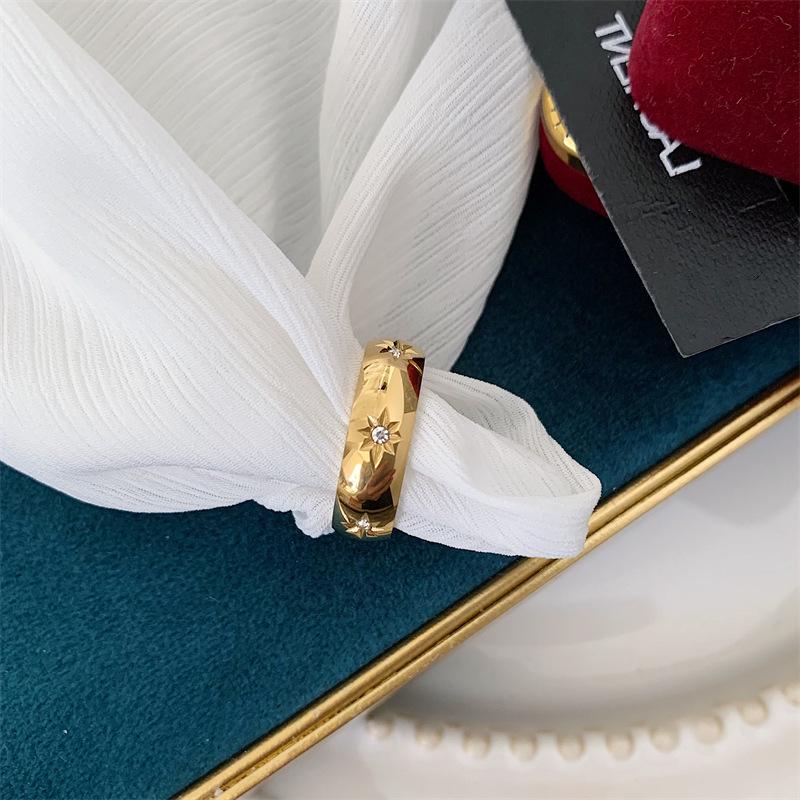 Gold-Plated Titanium Steel Ring with Diamonds and Eight-Pointed Star Design