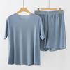 2-teiliges Loungewear-Set für Herren, O-Ausschnitt, kurzärmelige Oberteile, elastische Taille, Shorts mit weitem Bein, einfarbig, Homewear aus Eisseide, nahtloses Pyjama-Set