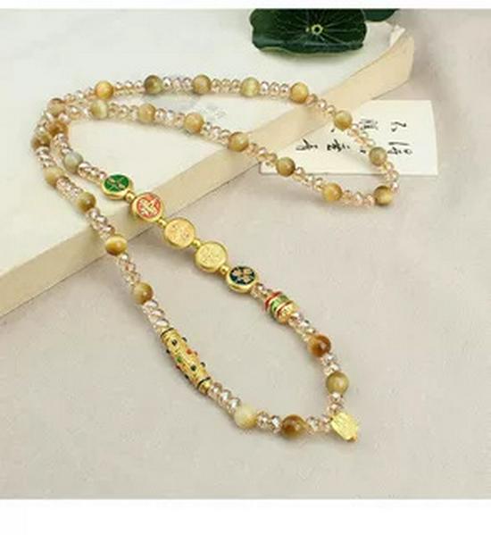 Golden Tiger Eye Beaded Necklace: Retro Crystal Pendant with Pixiu Charm for Women, Luxurious and Fashionable.