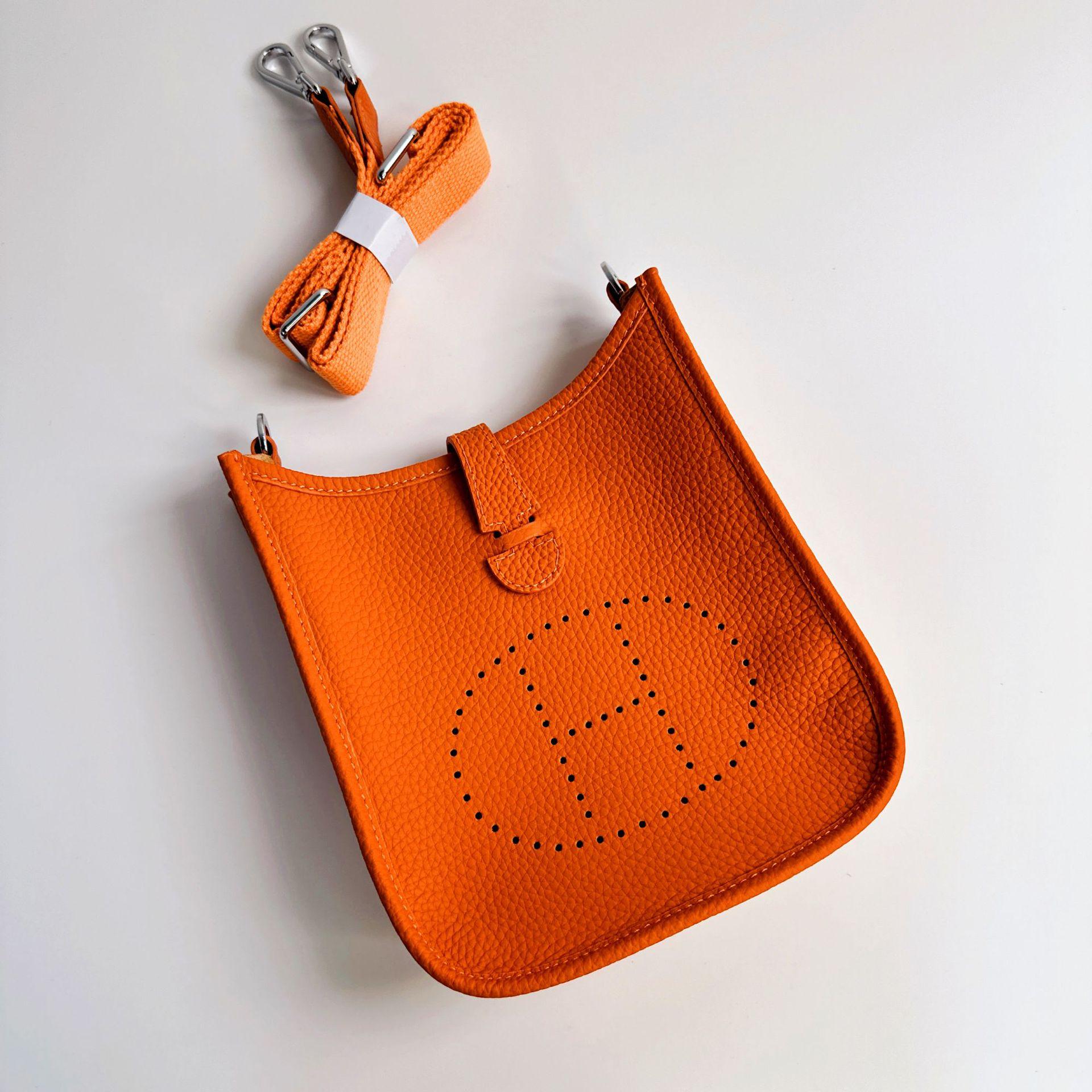 

Aomen Bao Женская сумка через плечо из натуральной кожи Высококлассная сумка-тоут из коровьей кожи с H-пряжкой, полая плетёная сумка с одним отделением 30x11x28cm оранжевый