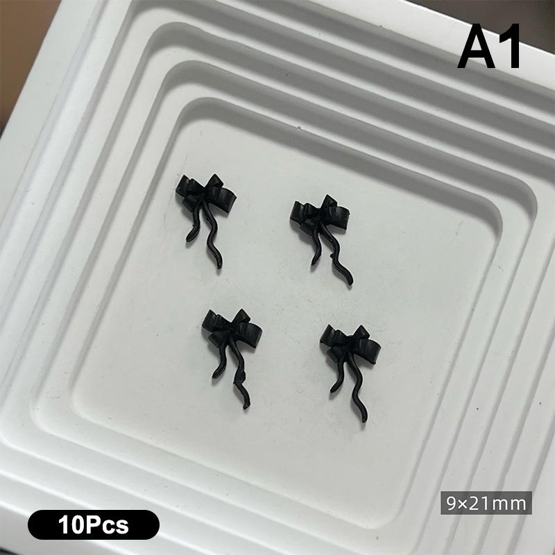 10 Stück Doppellagige Schleifen-Nagelanhänger 3D Süße Band-Schleifen Nagelkunst Strasssteine Mini Harz-Fliege Maniküre Schmuck DIY Teile