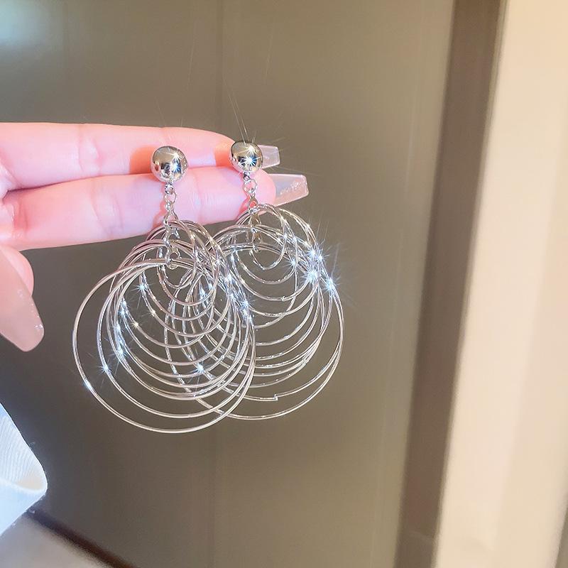 Exquisite Silver Needle Flower Bow Tassel Earrings - Luxury European & American Style for Women