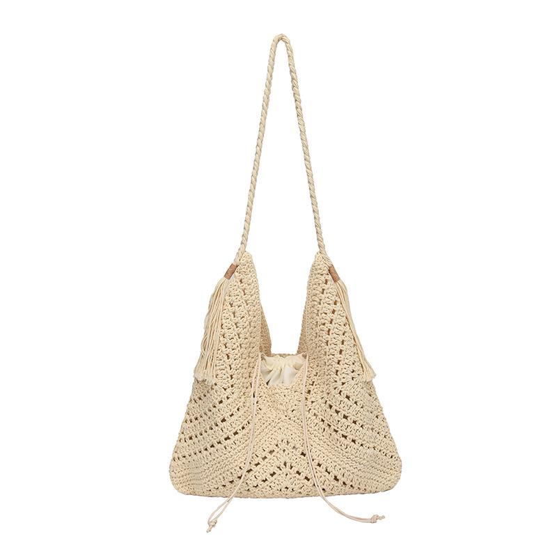 

2025 Retro Versatile Large-Capacity Woven Handbag - Stylish, Hollowed-Out Design for Commuters One Size