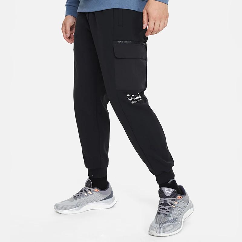 Li Ning Fitness Series Solid Color Multi-Pocket Printed Drawstring Fleece Cuffed Sports Pants Winter Men pants Black AKLR673-1