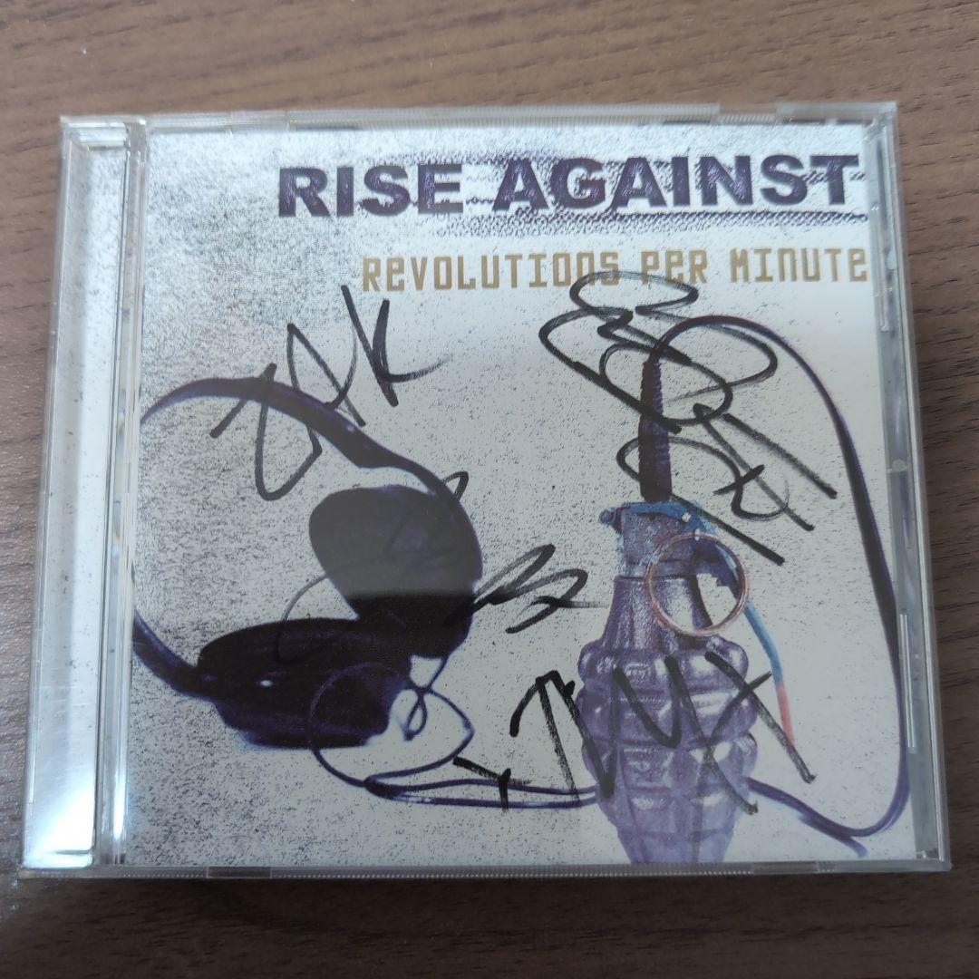 

[USED] Rise Against autographed