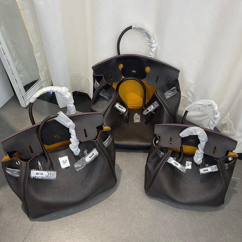 

Популярна жіноча сумка з натуральної шкіри першого шару платинова сумка жіноча сумка для носіння в руці з натуральної шкіри першого шару європейська та американська ретро сумка через плече 35cm