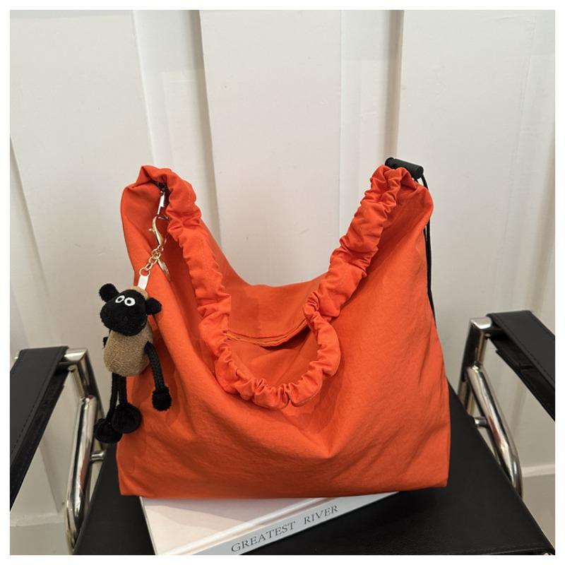 

Nylon cloth bag women s popular new fashionable large-capacity shoulder cotton clothing bag advanced (pendant can be removed) помаранчевий