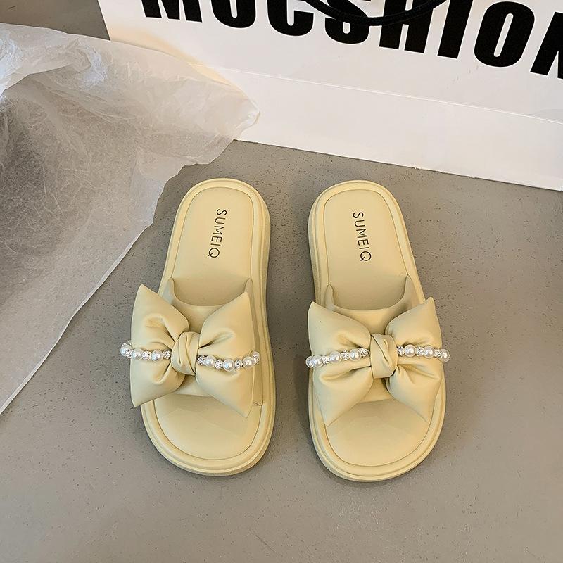 

Fairy wind flat-bottomed slippers female 2025 summer new Korean version of rhinestone bow word casual beach cool slippers 35 жёлтый