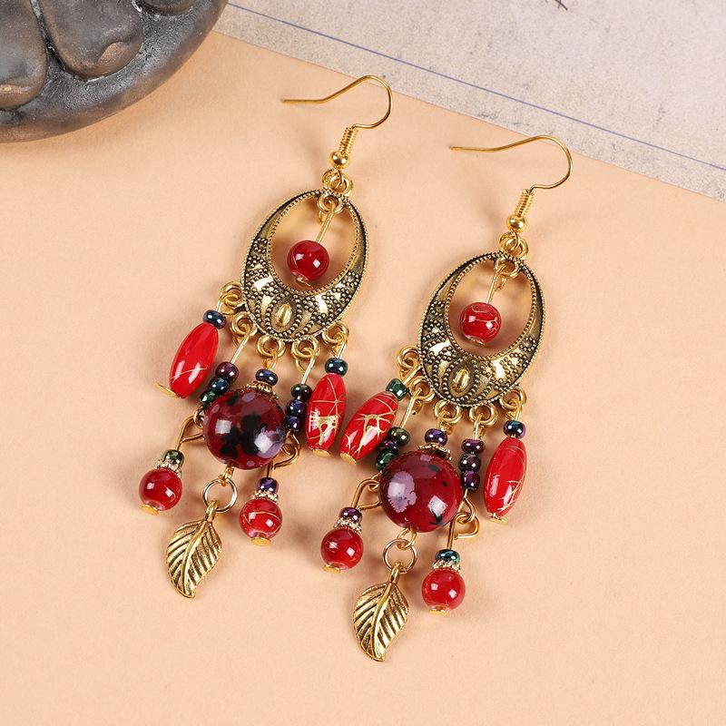 

Exotic style gold fringed earrings retro ethnic style bohemian temperament advanced sense earrings long earrings women