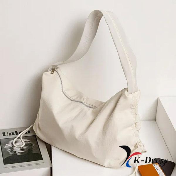 

Сучасна нейлонова сумка через плече з бічною складкою (2 кольори) 46x25x14cm слонова кістка