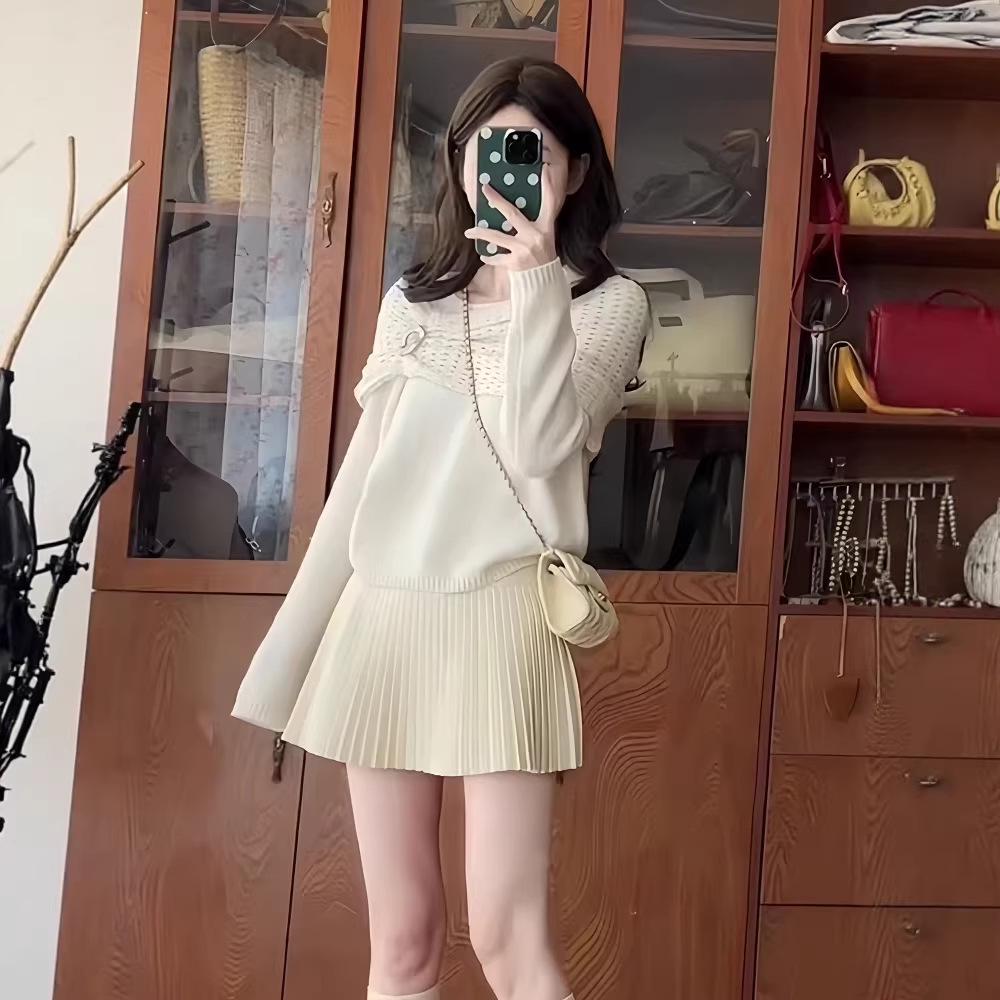 

Chic 2026 Tweed-Style Knit Sweater & Pleated Skirt Set. Medium