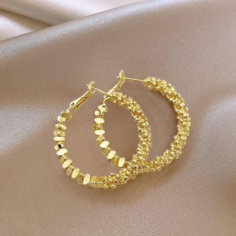 

Light luxury niche 111 silver needle broken silver earrings large earrings exaggerated circle earrings fashion temperament new earrings 925 silver needle