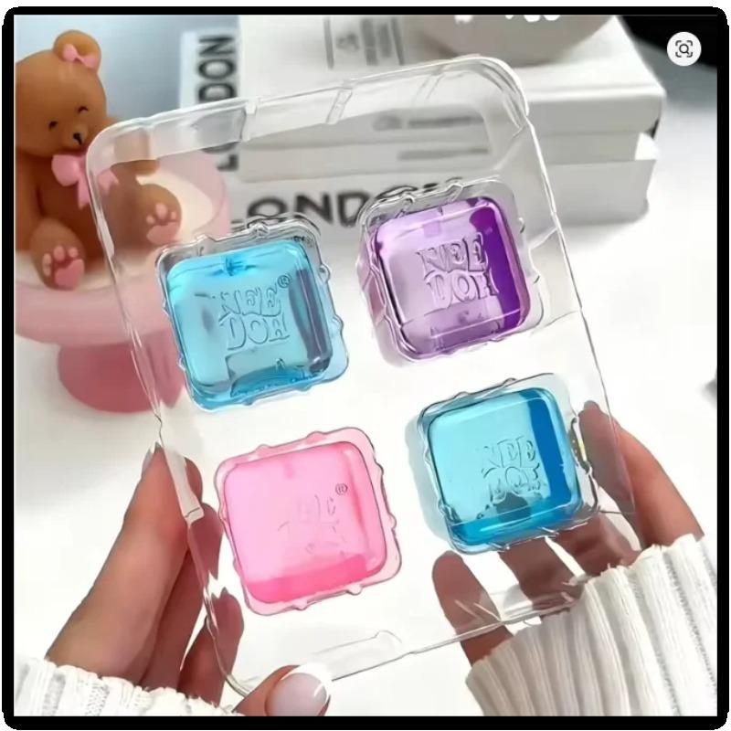 Needoh Teenie Nice Eiswürfel Fidget Spielzeug Mini 4er Pack Set Langsamer Rückprall Squishy Spielzeug Stressabbau Fidget für Partygeschenke Geschenke