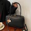 Nouveau sac bandoulière portable style simple de niche à la mode et haut de gamme polyvalent pour le travail et les loisirs pour femmes