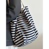 Large capacity striped canvas bag women's 2025 new niche embroidery lazy wind commuter portable shoulder tote bag