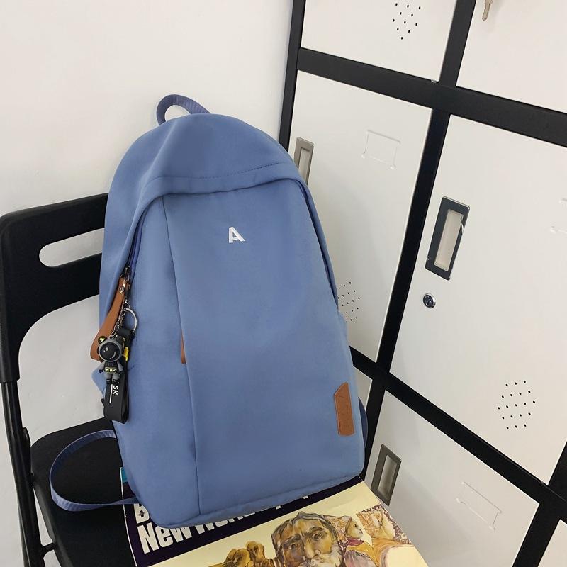 

Backpack Men s Large Capacity Junior High School High School Student School Bag Japanese Casual Versatile New Travel Backpack Women Single Pack синій
