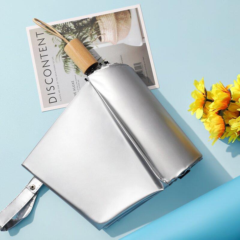 Solid color wooden handle three-fold umbrella wholesale 8-bone silver glue sun protection and UV protection folding umbrella manual umbrella