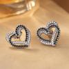 Hot-selling daily wear stud earrings for women, black and white love diamond-encrusted hollow jewelry, light luxury and versatile sweet earrings
