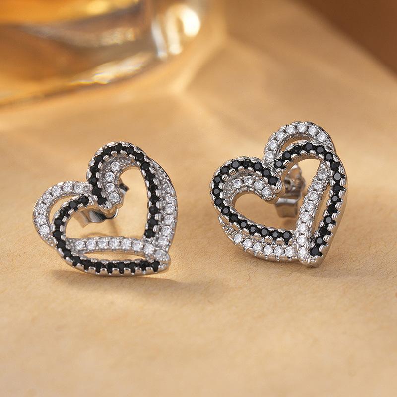 Hot-selling daily wear stud earrings for women, black and white love diamond-encrusted hollow jewelry, light luxury and versatile sweet earrings