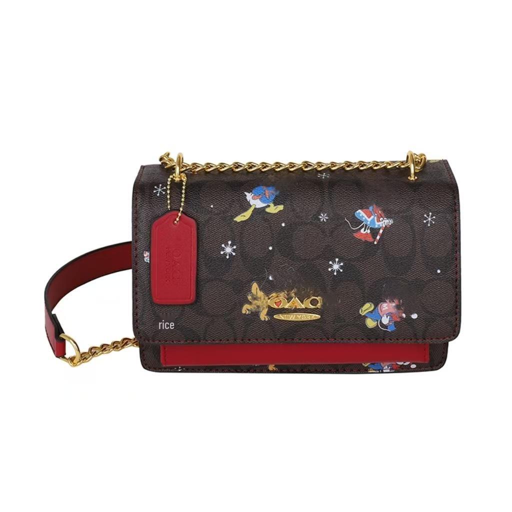 

2024 Chain Versatile Cartoon Shoulder & Crossbody Bag for Women – Fashionable Textured Commuter Style.