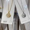 Luxury Retro Sun and Cross Pendant Necklace for Women – High-End Titanium Steel Clavicle Chain