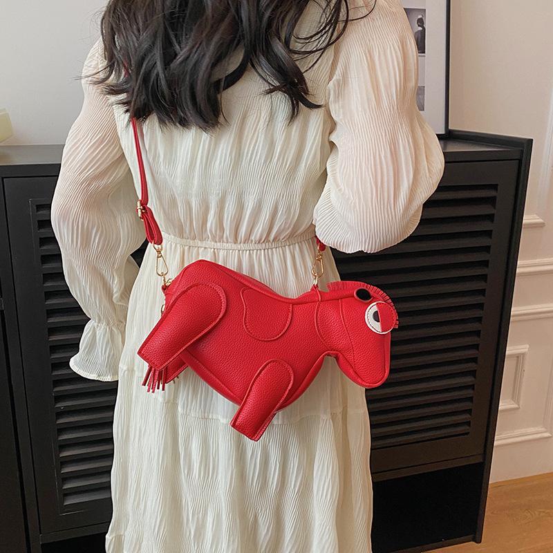 Personalized small bag new 2025 Japanese soft girl cartoon doll doll ugly cute one-shoulder tassel net red crossbody bag