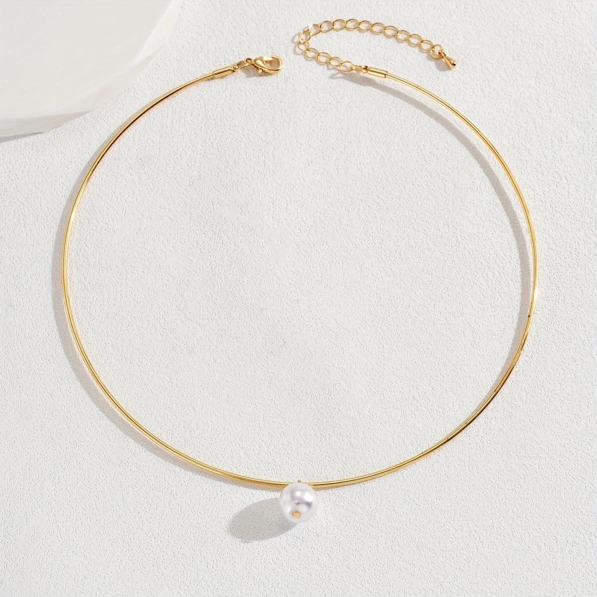 

Элегантный минималистичный золотой чокер с жемчужной подвеской – европейский и американский стиль золотой
