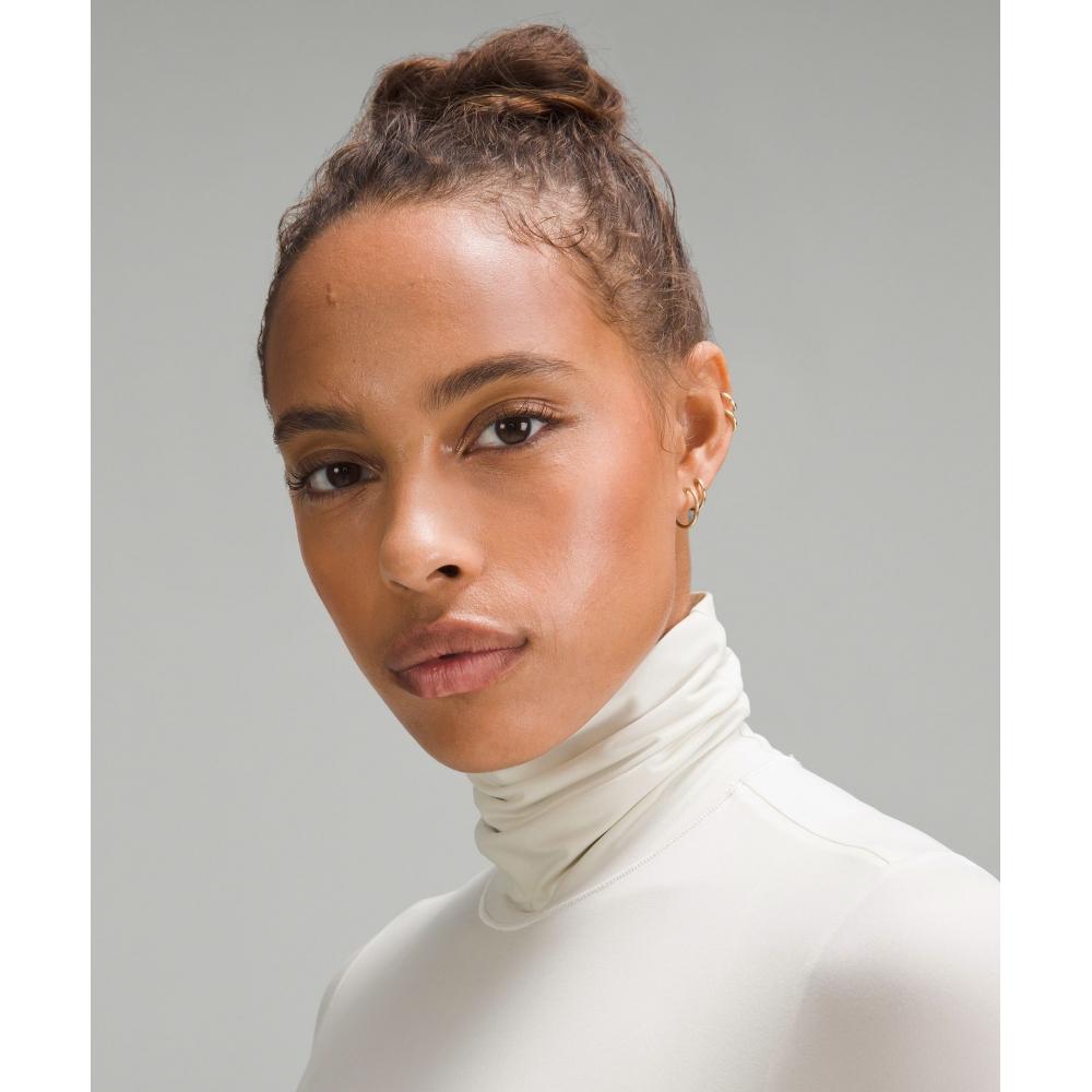 Lululemon Wundermost Ultra Soft Nulu Turtleneck Bodysuit Bone