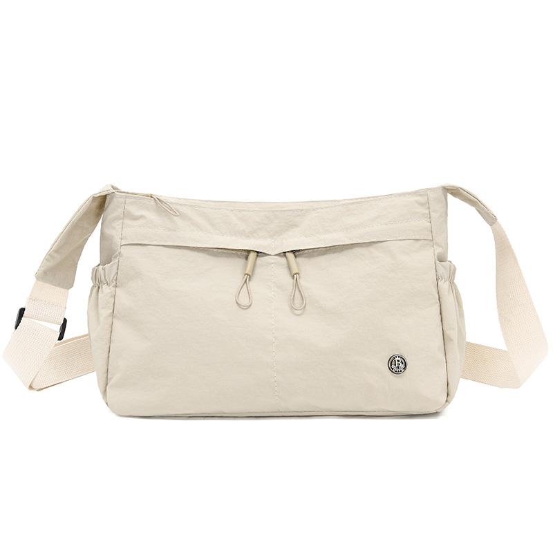 

Женская сумка через плечо большой емкости для мам среднего возраста бежевый