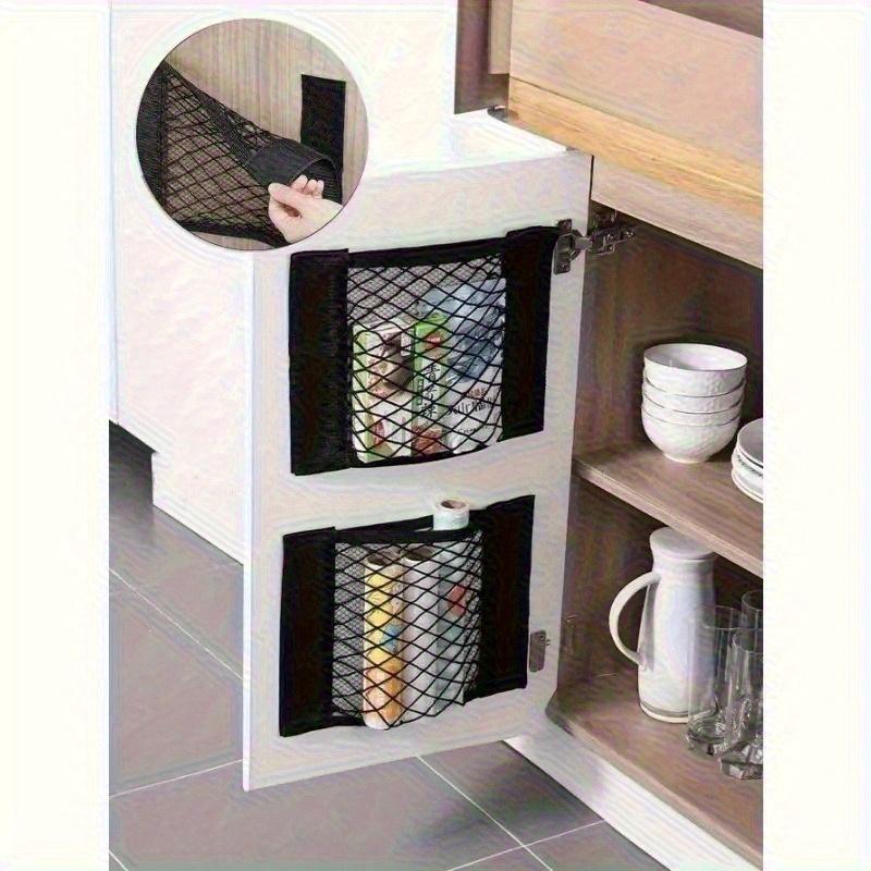 

2pcs Wall Mounted Storage Net Bags. Suitable Behind Cabinet Doors and Under Sinks. Can Store Garbage Bags, Drinks, Toys,Tools. 30cm(With adhesive )
