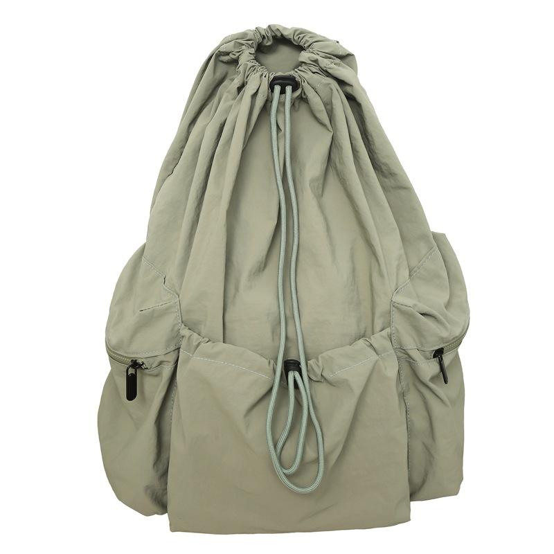 Schoolbag Korean version lazy wind drawstring backpack women's bag 1011 summer new high-value large-capacity lightweight breathable backpack