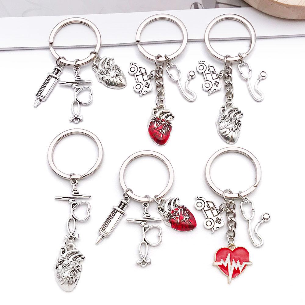 Antique Silver Medical Series Keychain: Syringe, Stethoscope, Heart, Ambulance, and ECG Zinc Alloy Pendant