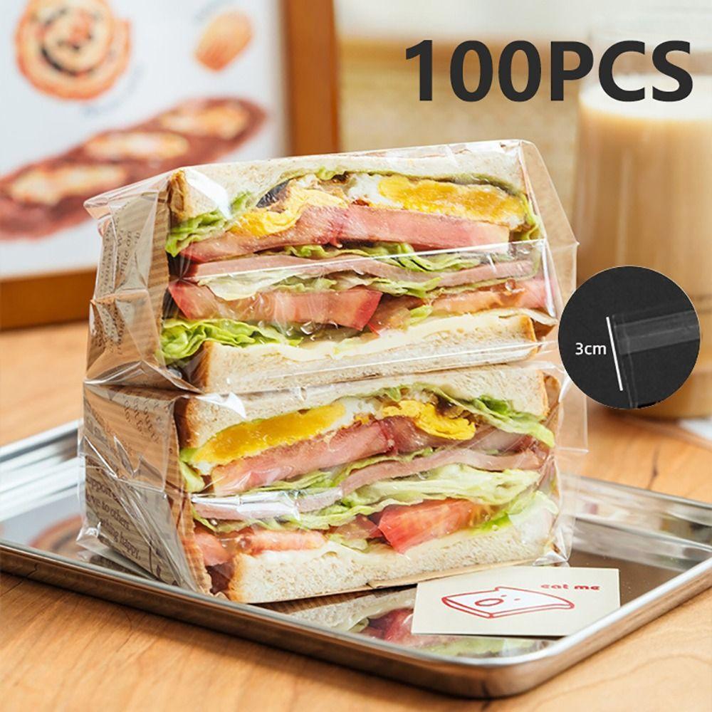 

100Pcs Disposable Sandwich Packaging Bag Transparent Plastic Baking Bag Bread Toast Cookies Self-adhesive Bag
