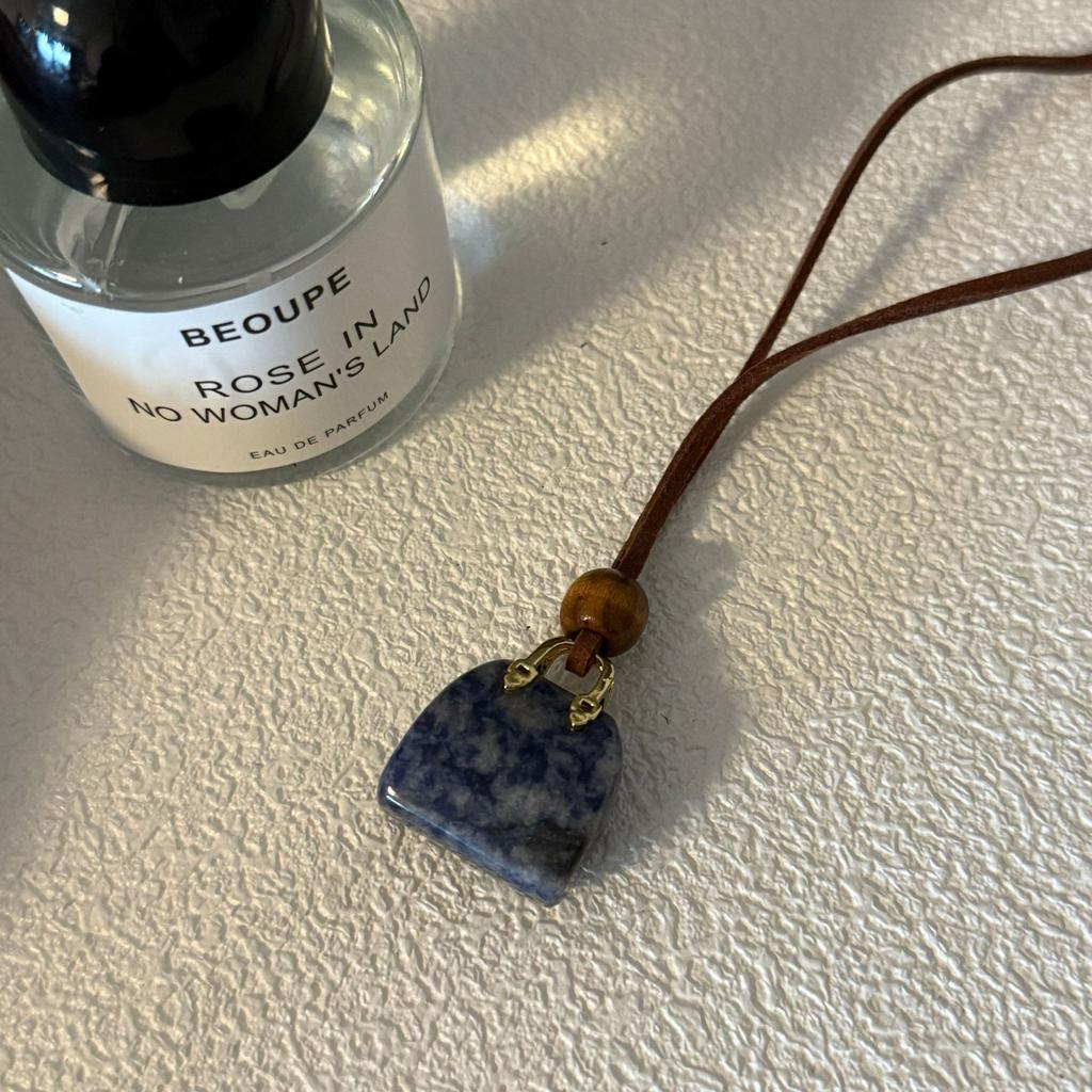 Colored artificial stone bag, wood beads, leather necklace, personalized creative design, sweater chain, Korean ins style necklace.