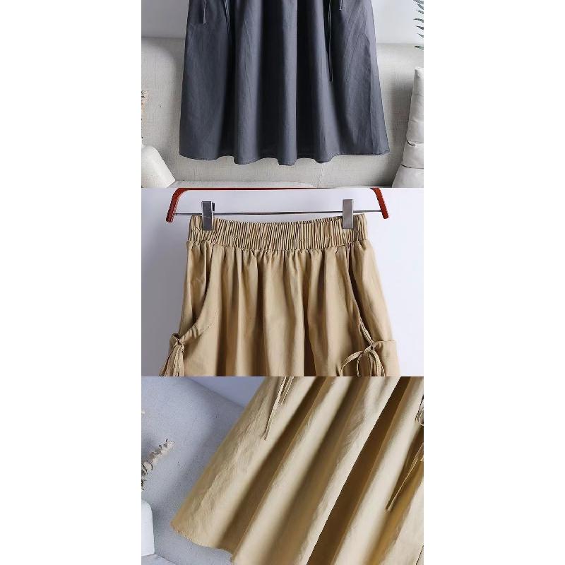 Drawstring midi skirt for women, 2026 summer new style, versatile solid color, drawstring pocket, elastic waist, mid-length workwear skirt