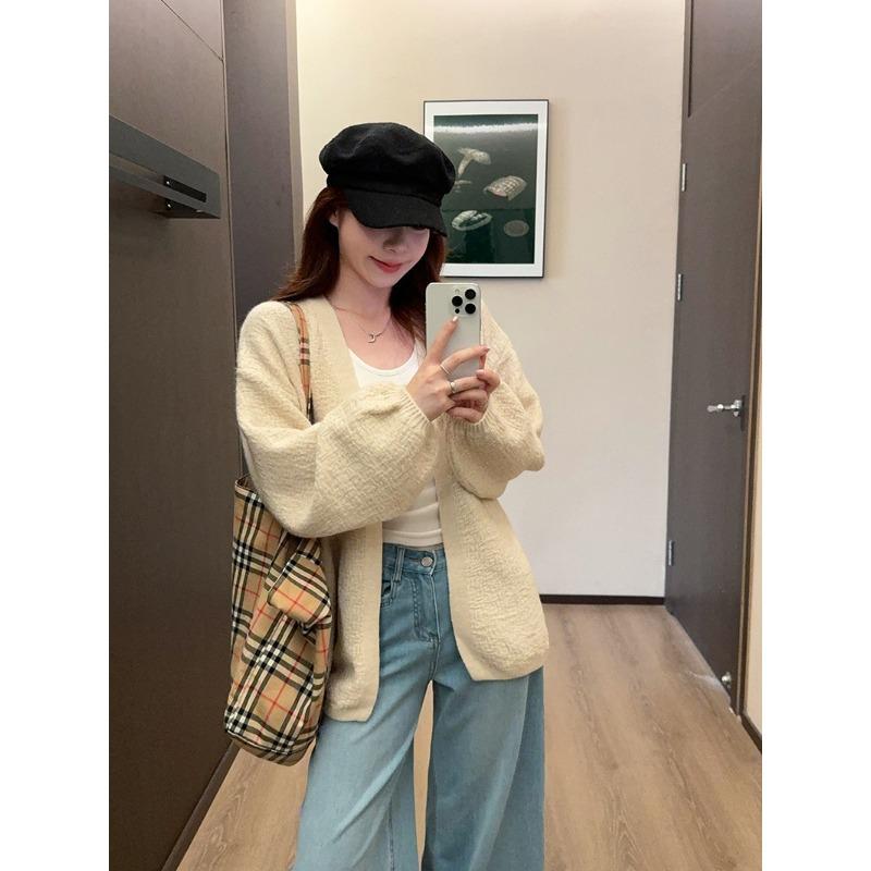 Autumn and winter new lazy style bark pattern fashionable versatile loose medium and long bubble sleeve knitted sweater jacket women