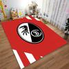 Red and Black Oval Crest Design suitable as a non-slip mat for the living room or bedroom sofa
