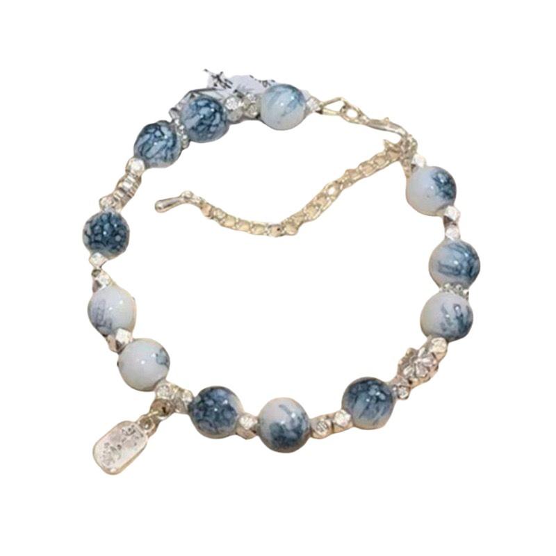 Hot-Selling Blue and White Porcelain Color Matching Ancient Style Butterfly Tassel Bracelet for Women, Niche Design, New Chinese Style Peace and