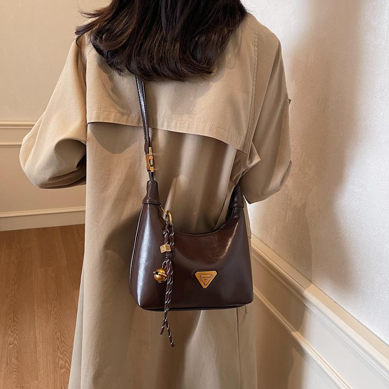 High-end niche bag women's spring retro new fashion messenger bag women's portable work dumpling bag