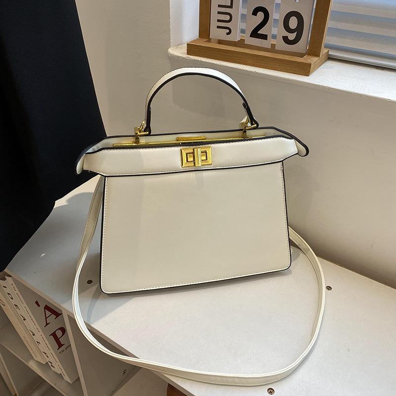 New High-end Solid Color Lock Kaibaoli Portable Shoulder Oblique Span Women's Bag