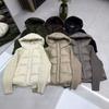 Autumn and Winter New Hooded Knitted Sleeved Down Jacket Women's Short Thickened Warm Splicing Foreign Style Jacket Tide