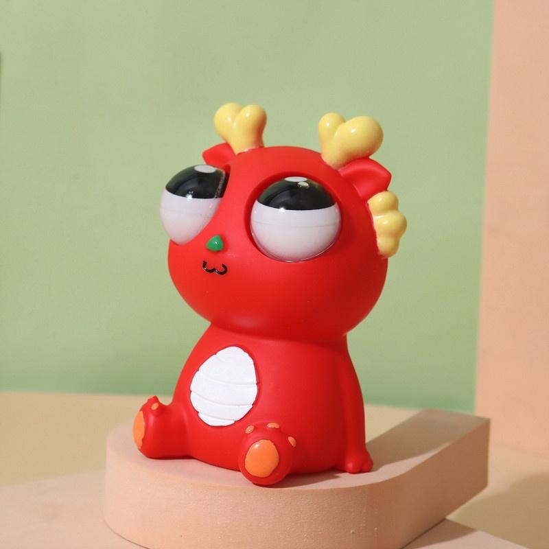 Kreatives DIY Kindersqueezetoys Fröhlicher Milchdrache Explodierauge Drache Kinder Zum Stressabbau Freude Quetschen Starrendes Auge