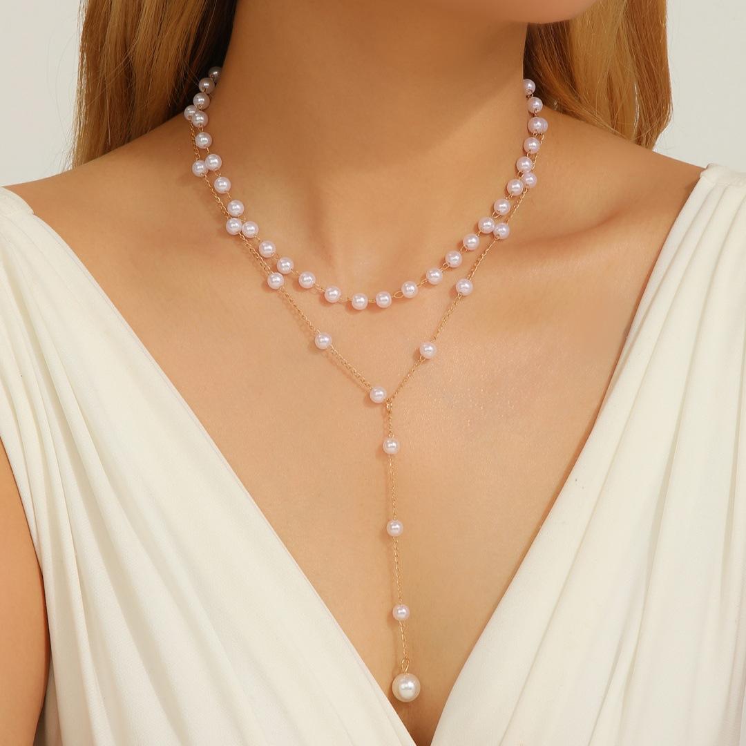 

New Simple Long Imitation Pearls Back Necklace for Women Sexy Tassel Pearl Harness Bikini Chest Chain Body Jewelry золотистый