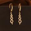 A Women's 18k Gold-plated Braided Twisted Ear Cuff with Embedded Synthetic Zirconia Long Earrings, Featuring a Simple, Elegant