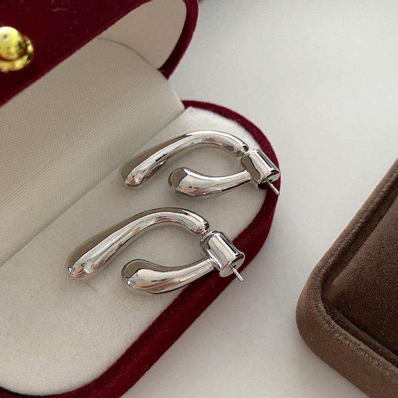 

Серьги-пусеты в форме капли: Двусторонний дизайн, Минималистичный стиль высокого класса