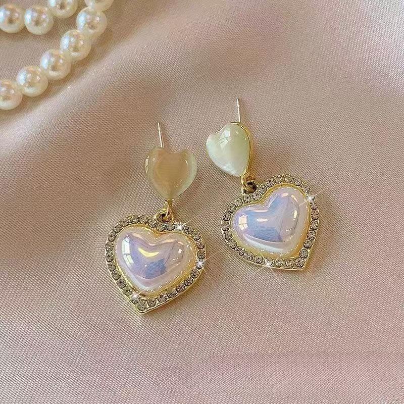 Pendientes de perlas de alta gama de moda Pendientes retro de nicho francés de lujo ligero Pendientes de perlas simples y versátiles para mujer