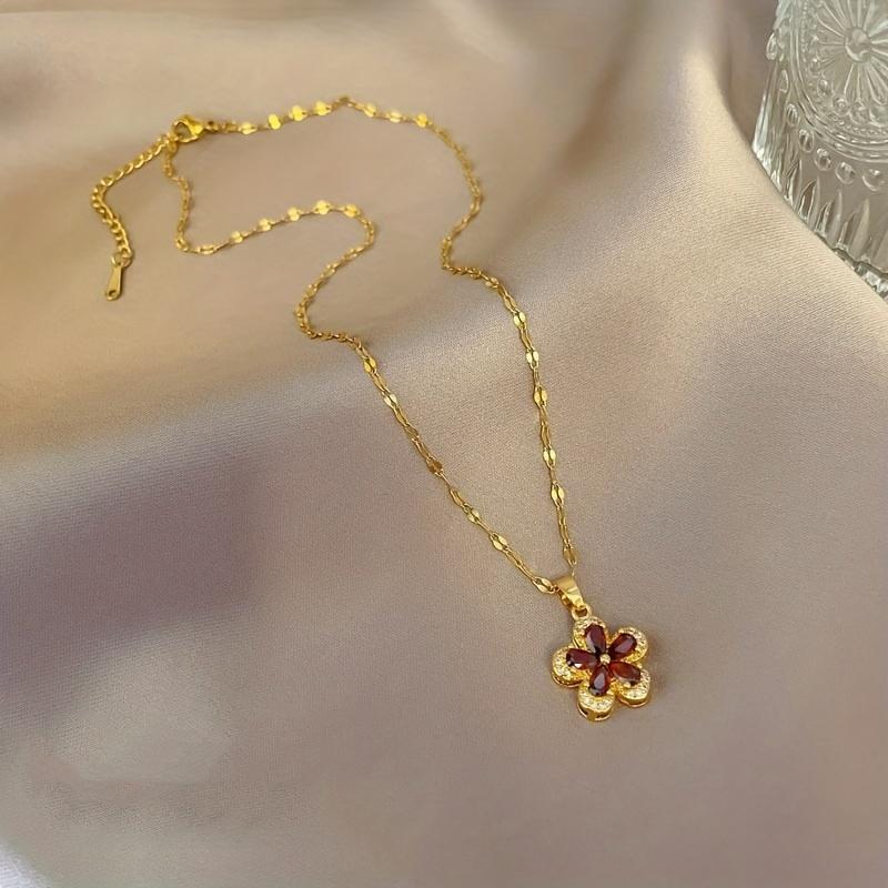 A Stylish Necklace Featuring a Five-Petal Flower Design Made of Stainless Steel, Available in a Vibrant Red Color, Suitable for Both Men And Women